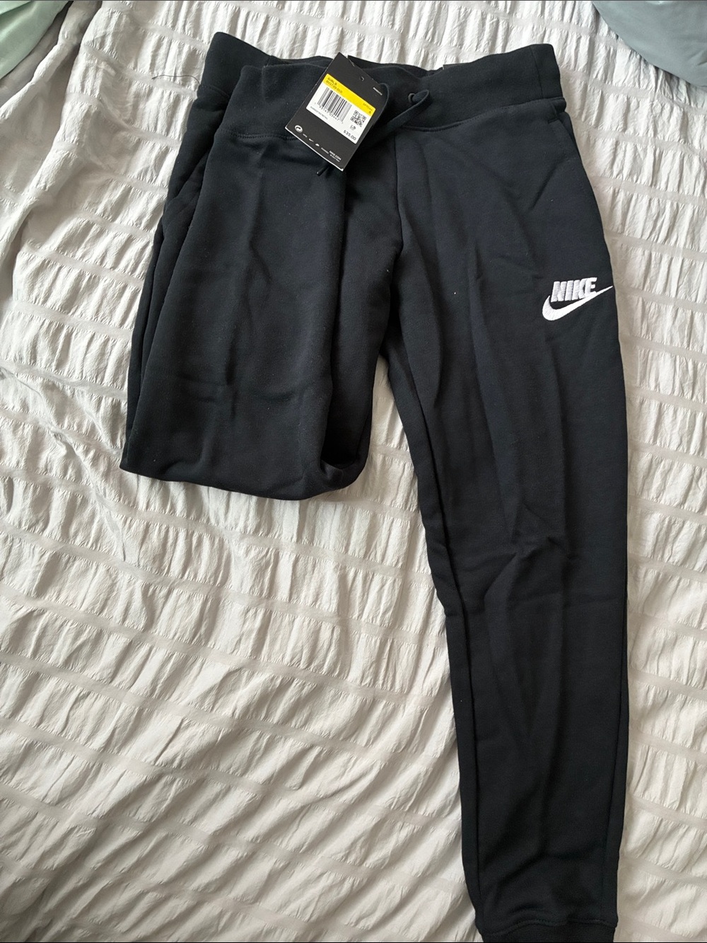Nike Black Jogger Sweatpants with White Swoosh